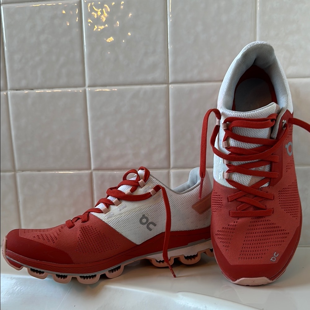 On Cloud Running Red and White Sneakers